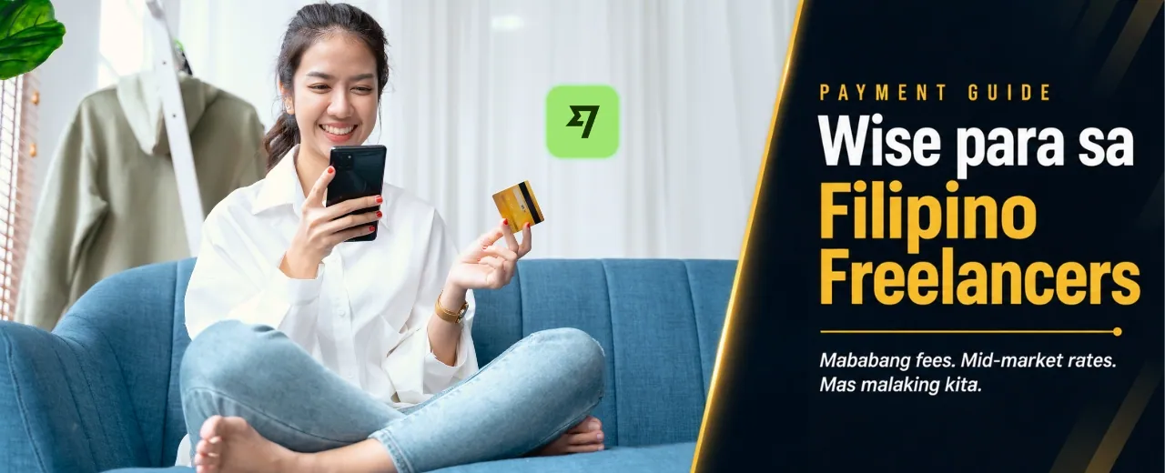 Filipino freelancer sitting on sofa holding card and checking Wise app on phone to receive international payment