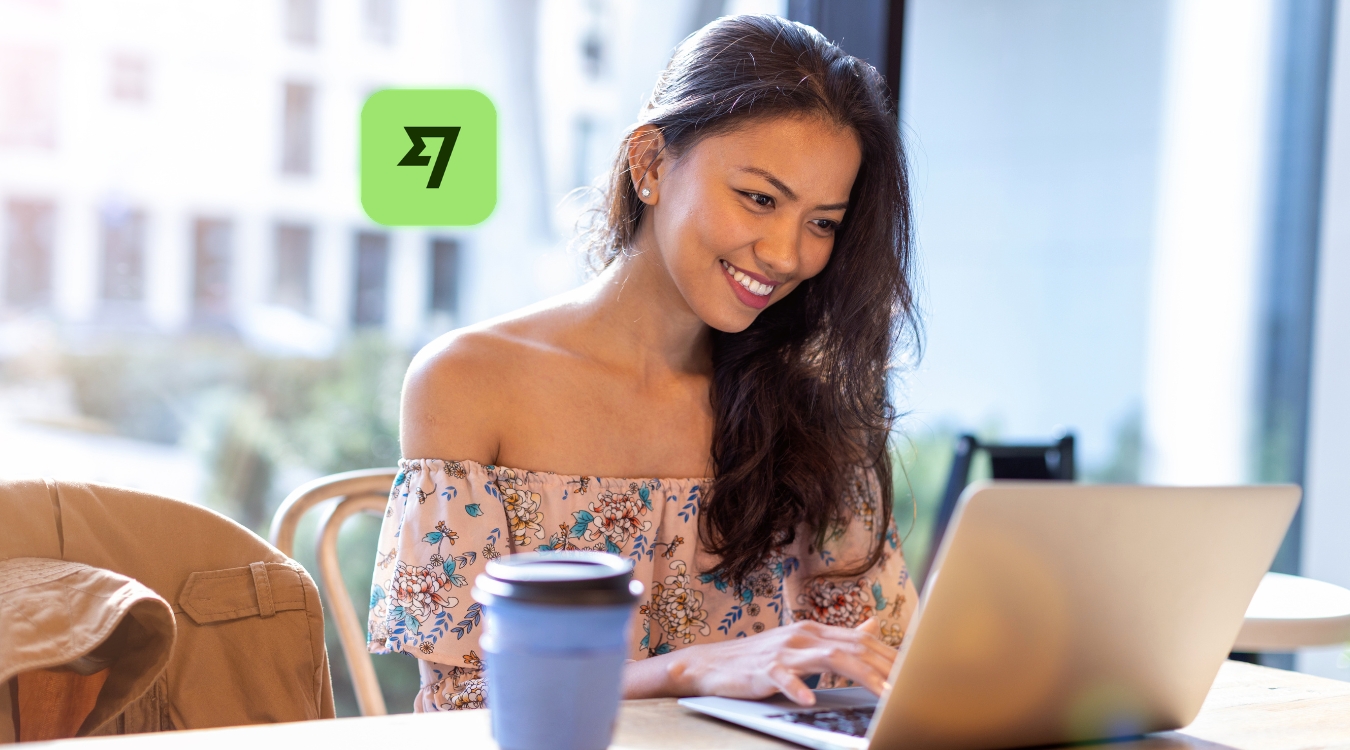 Filipino freelancer happily using laptop after successfully receiving international income on Wise app